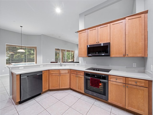 kitchen with dishwashing machine, stainless steel microwave, oven, black electric cooktop, and a sink