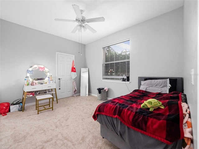 bedroom with carpet, baseboards, and ceiling fan