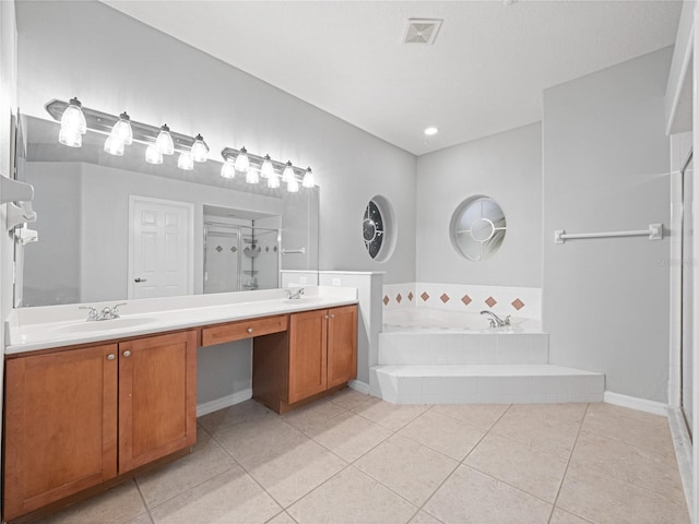 bathroom with double vanity, a stall shower, a sink, and visible vents