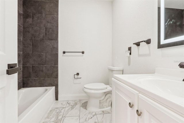 full bath with toilet, marble finish floor, baseboards, bathing tub / shower combination, and vanity