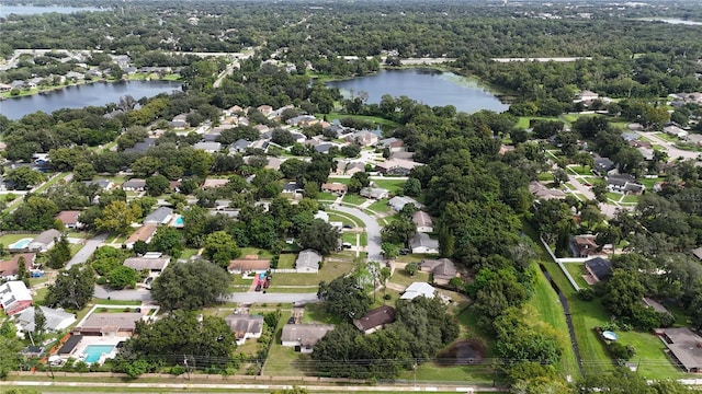 drone / aerial view with a water view