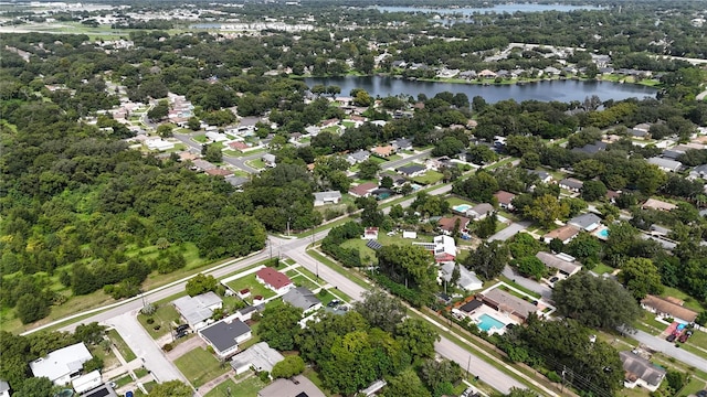 drone / aerial view featuring a water view and a residential view