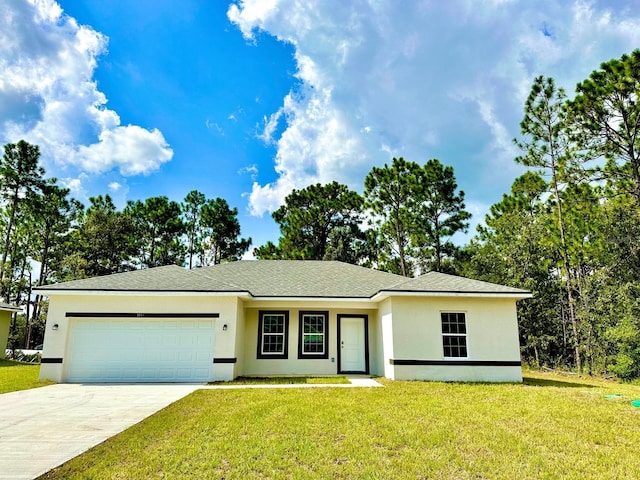 ranch-style home with a garage and a front yard