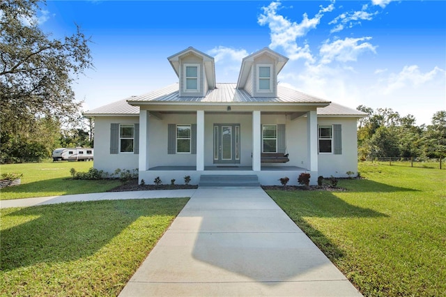 view of front of house featuring a front yard and a porch