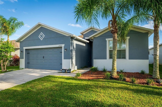 view of front facade featuring a garage and a front yard