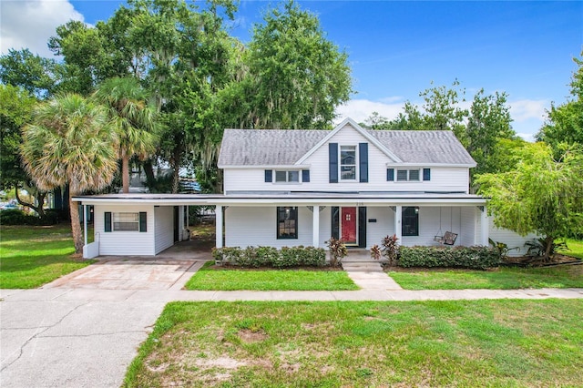 view of front of house with covered porch and a front yard