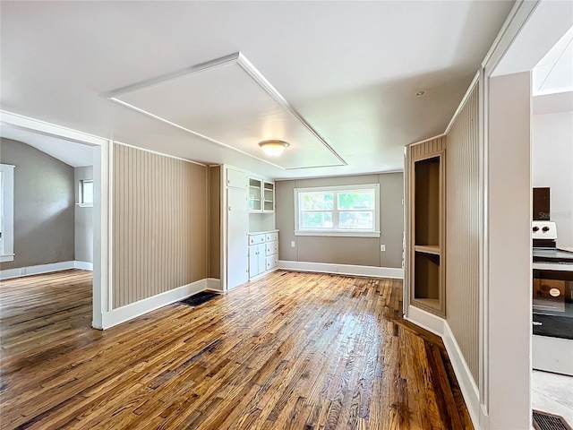 unfurnished room featuring hardwood / wood-style floors