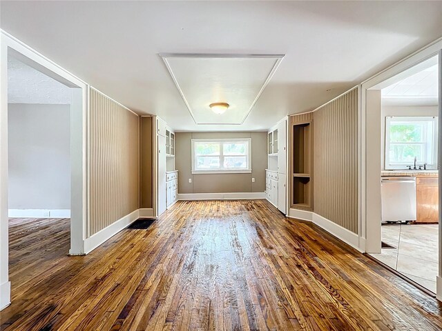 interior space with dark wood-type flooring and sink