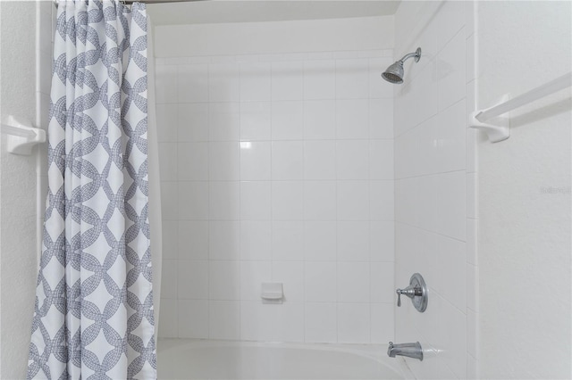 bathroom with shower / tub combo