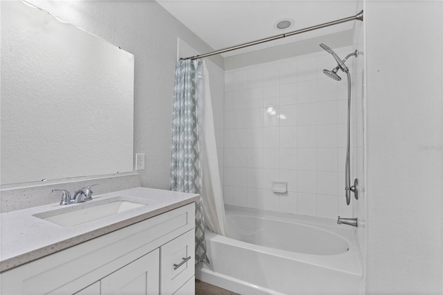 bathroom with vanity and shower / tub combo with curtain