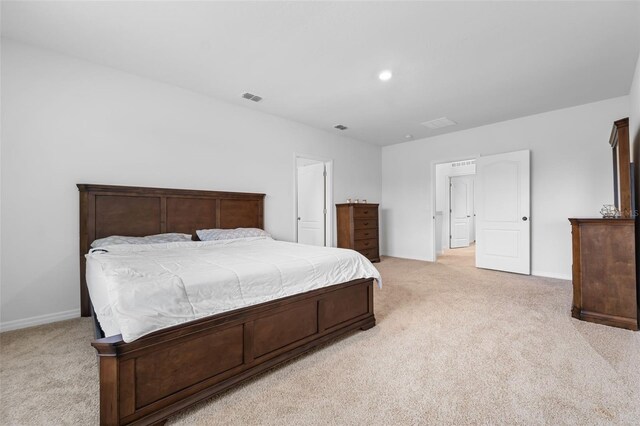 bedroom with light carpet