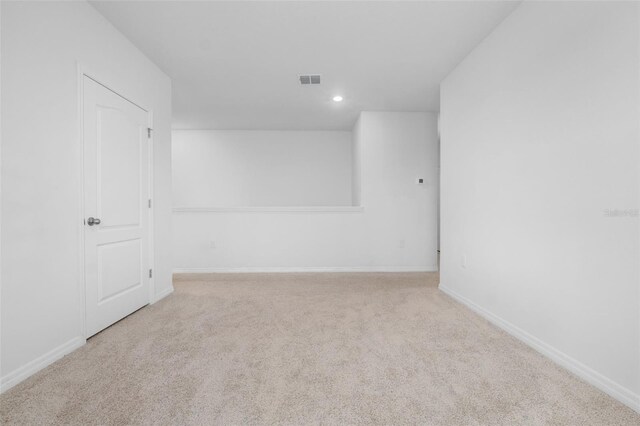 empty room with light carpet