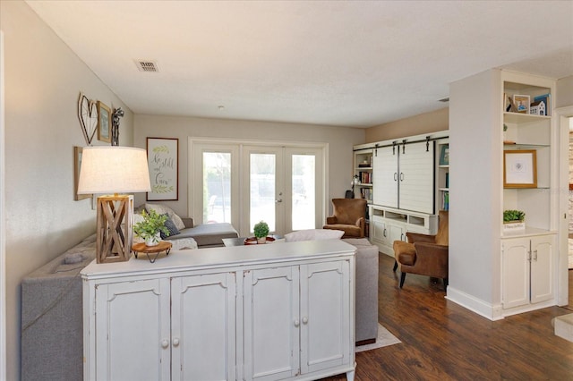 kitchen featuring french doors and dark hardwood / wood-style floors