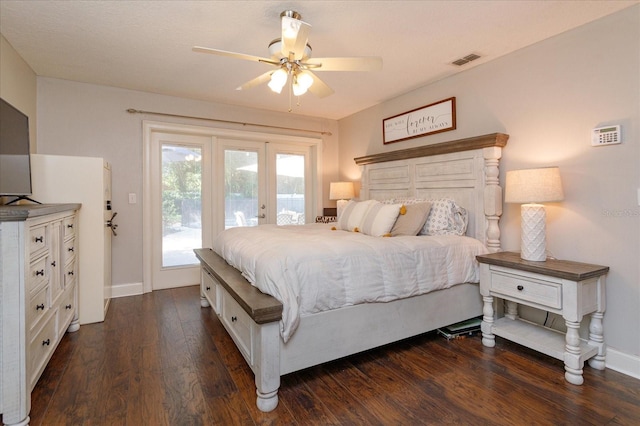 bedroom with ceiling fan, dark hardwood / wood-style floors, and access to exterior