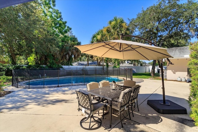 view of patio with a fenced in pool