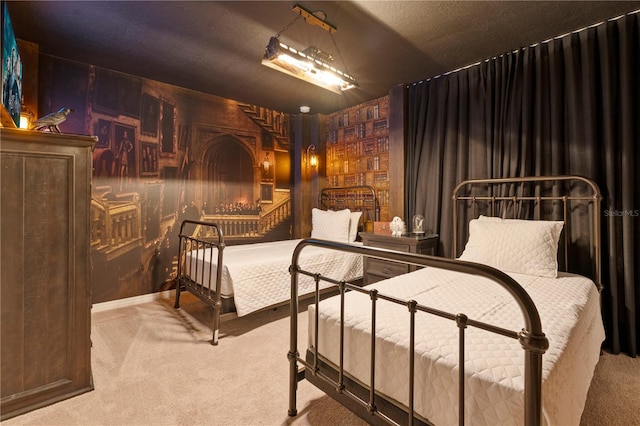 carpeted bedroom featuring wood walls and a textured ceiling