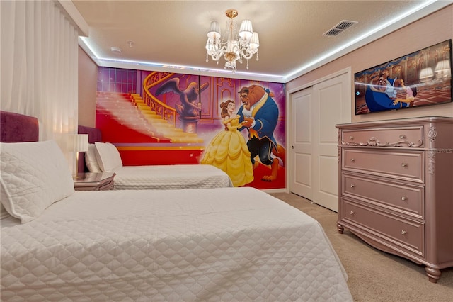 bedroom featuring light carpet, a chandelier, and a closet