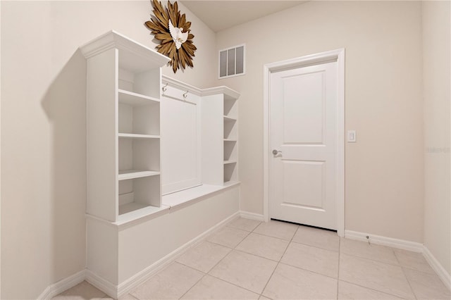 mudroom featuring light tile patterned flooring