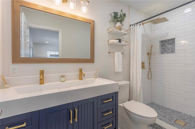 bathroom with toilet, a shower with curtain, and vanity