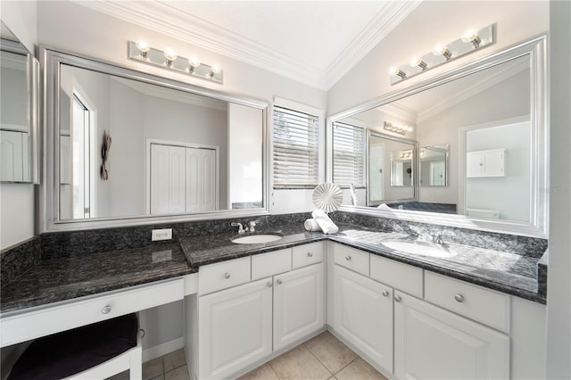 bathroom with tile patterned floors, vanity, crown molding, toilet, and lofted ceiling