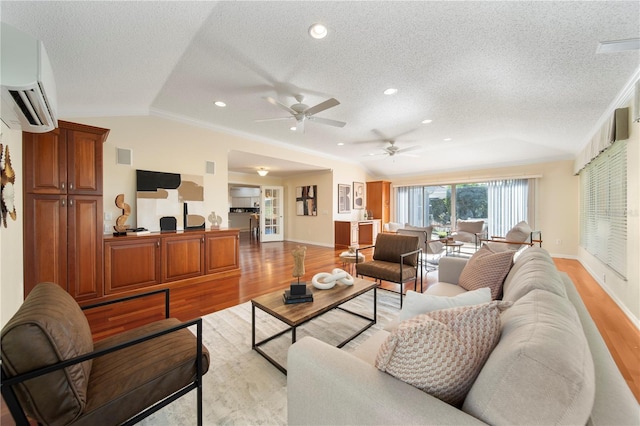 living room with ornamental molding, a textured ceiling, and vaulted ceiling