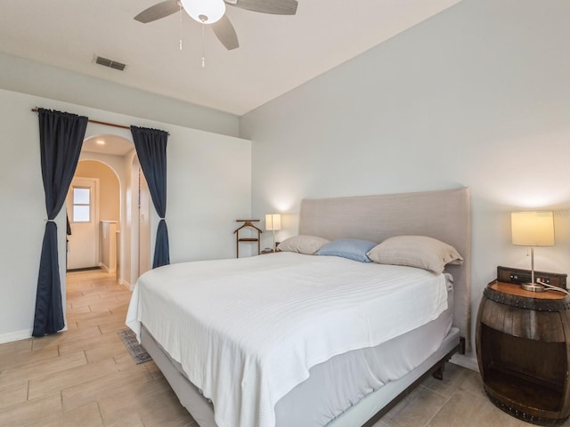 bedroom featuring light hardwood / wood-style flooring and ceiling fan