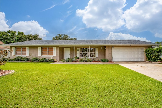 ranch-style house with a front yard and a garage