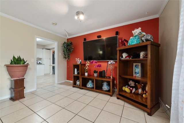 interior space with light tile patterned floors and ornamental molding