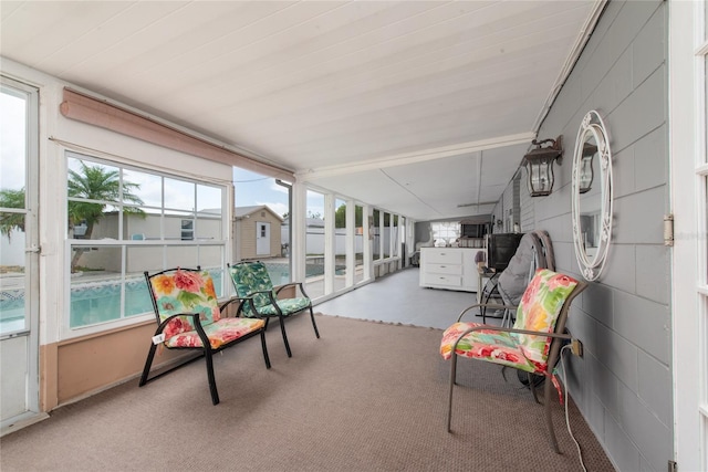 sunroom / solarium featuring a healthy amount of sunlight