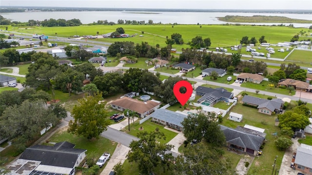 drone / aerial view featuring a water view