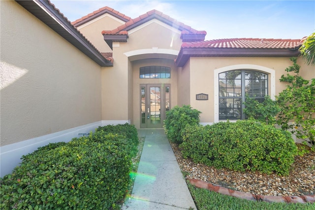 doorway to property featuring french doors