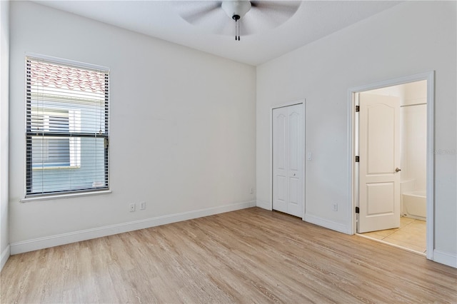 unfurnished room with ceiling fan and light hardwood / wood-style flooring