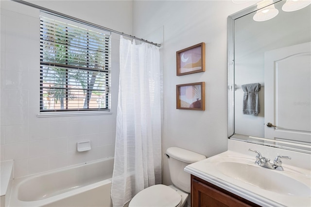 full bathroom with vanity, toilet, and shower / bathtub combination with curtain