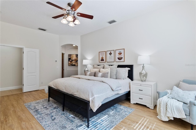 bedroom with ceiling fan and light hardwood / wood-style floors