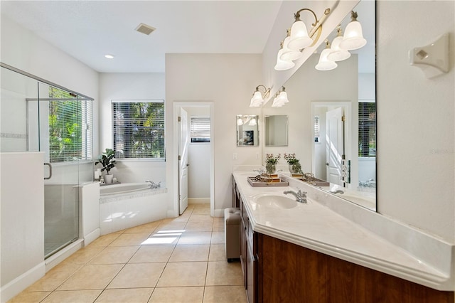 bathroom featuring vanity, tile patterned flooring, a chandelier, and shower with separate bathtub