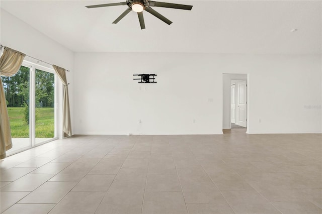 empty room featuring ceiling fan and light tile patterned floors