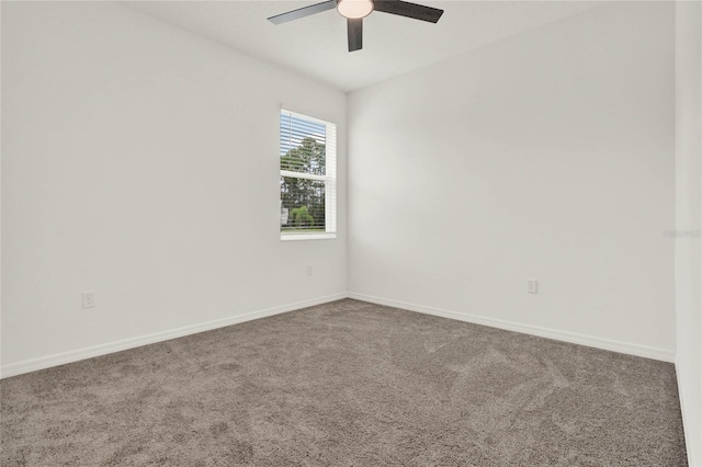 spare room with carpet flooring and ceiling fan