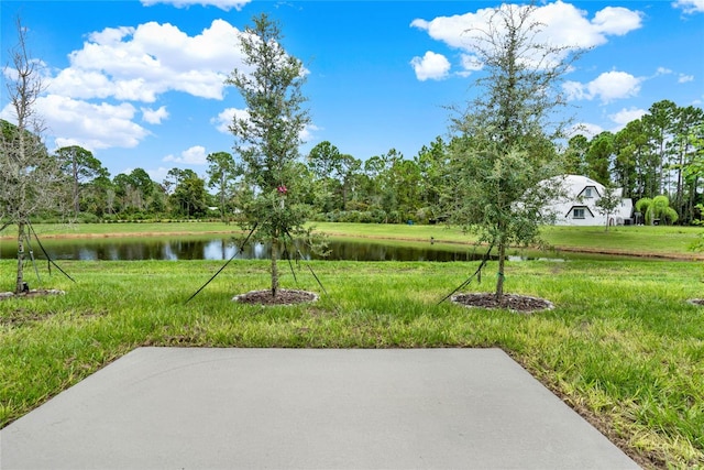 view of patio / terrace featuring a water view