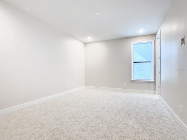 spare room featuring carpet flooring