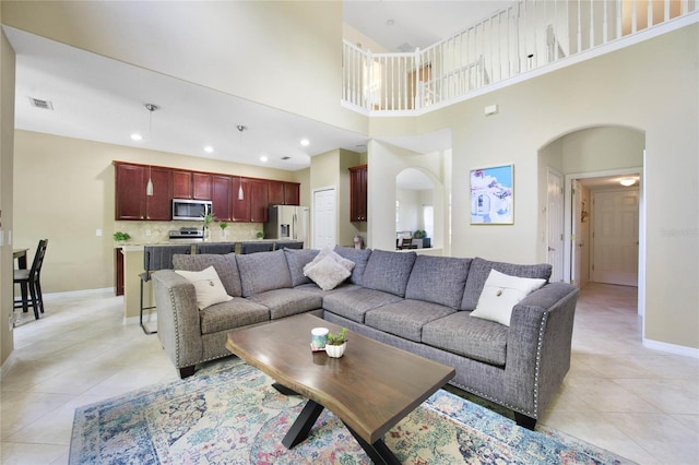 living room with light tile patterned floors