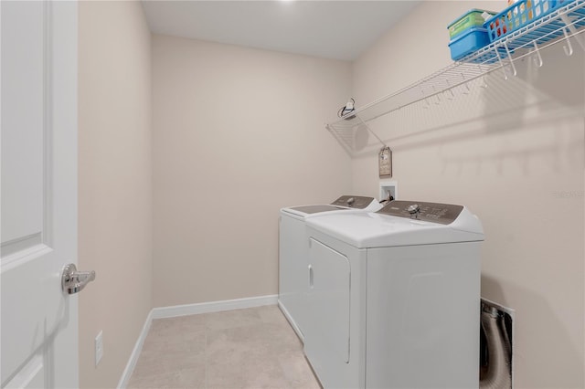 laundry room with washer and dryer