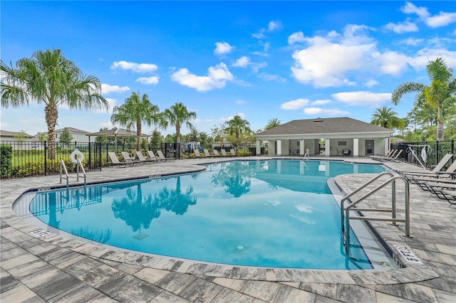 view of pool featuring a patio