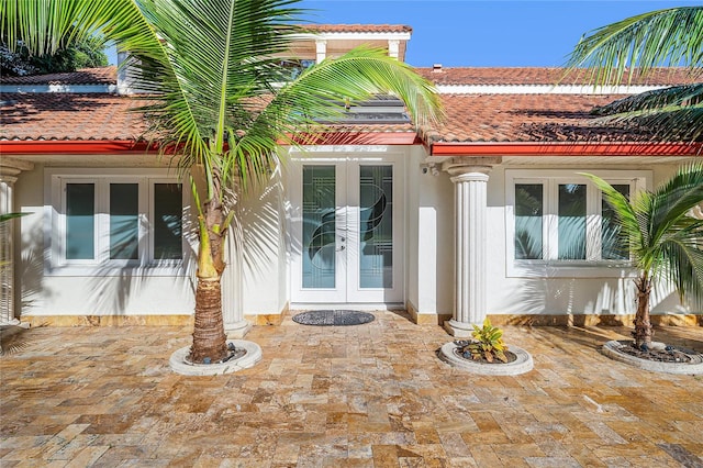 view of exterior entry with french doors