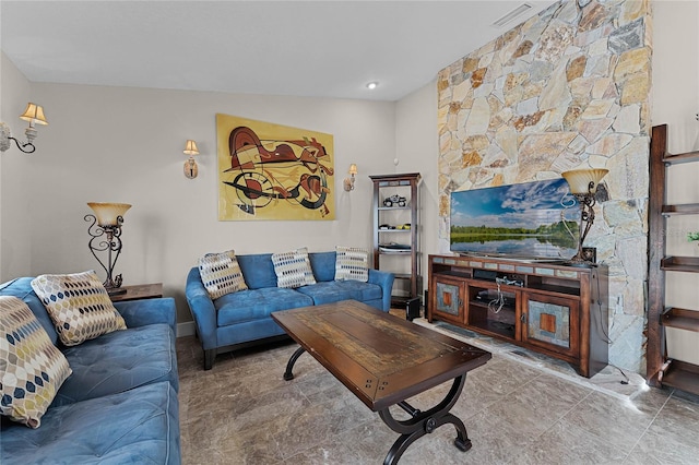 living room featuring lofted ceiling