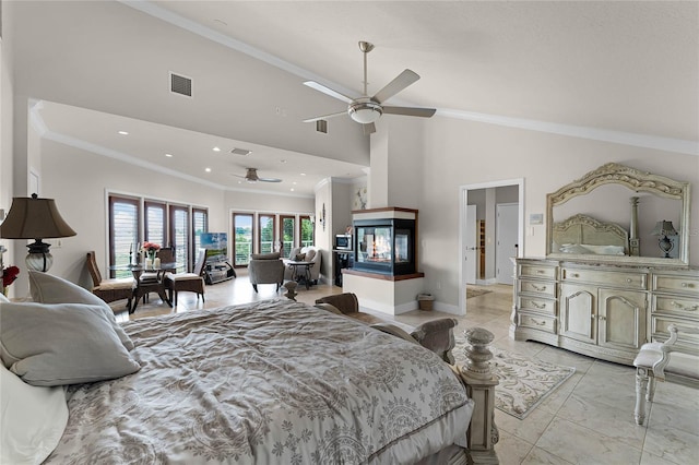 bedroom with ceiling fan, a multi sided fireplace, crown molding, and high vaulted ceiling