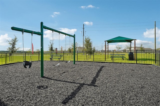 community jungle gym featuring fence