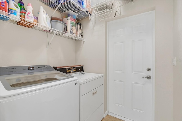 laundry area featuring laundry area and independent washer and dryer