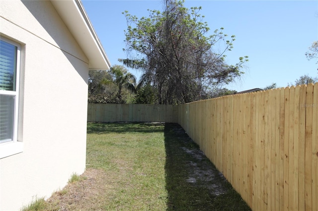 view of yard featuring a fenced backyard