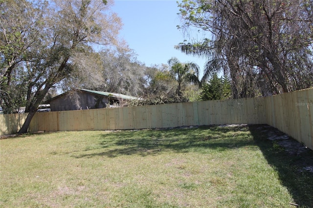 view of yard featuring a fenced backyard