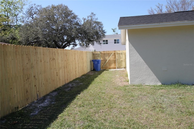 view of yard featuring a fenced backyard